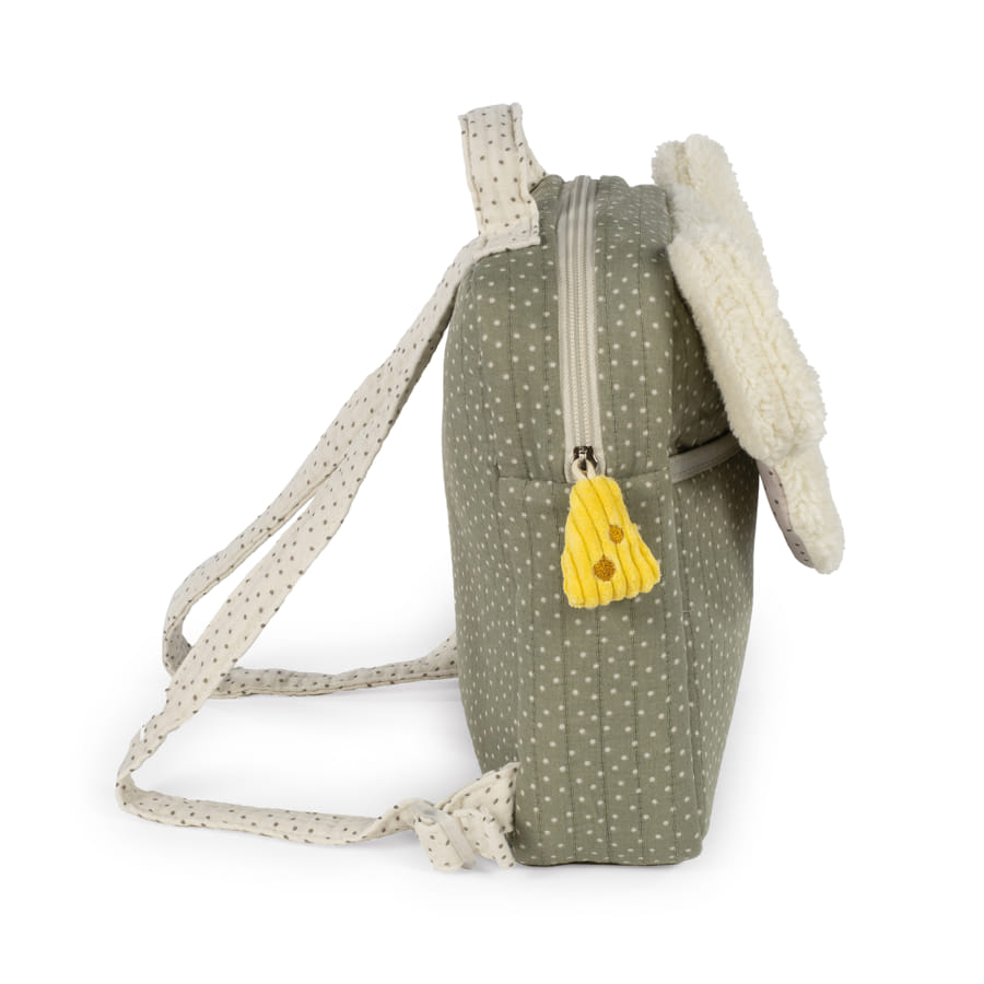Mochila infantil verde com pontos brancos e detalhe peludo creme