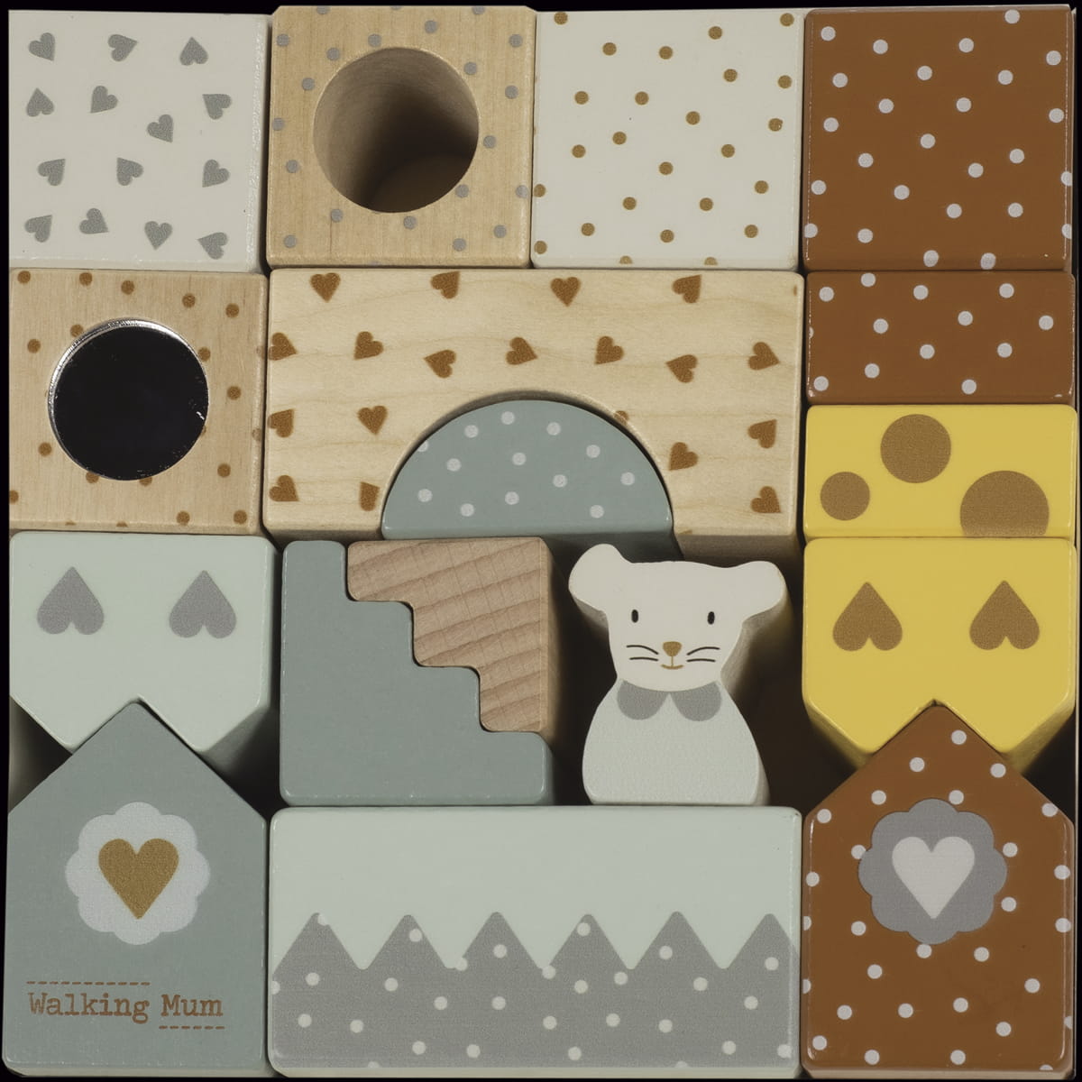 Conjunto de blocos de madeira coloridos com padrões e figura de cão