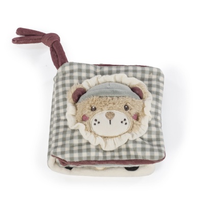 Livro infantil de tecido com rosto de urso em peluche na capa