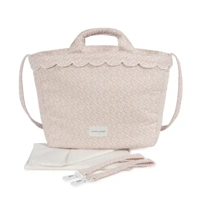 Bolsa de bebé rosa claro com padrão floral pequeno e alça