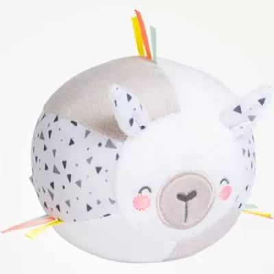 Almofada redonda branca e cinzenta com padrão e rosto de animal sorridente