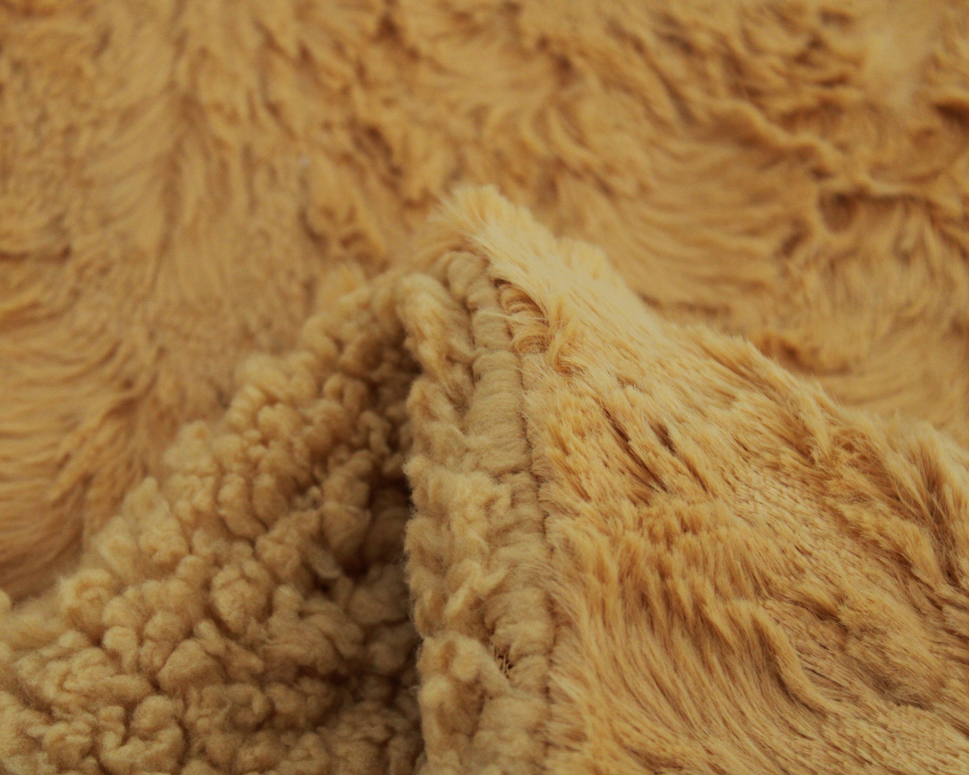 tecido de pêlo sintético bege claro com textura dupla