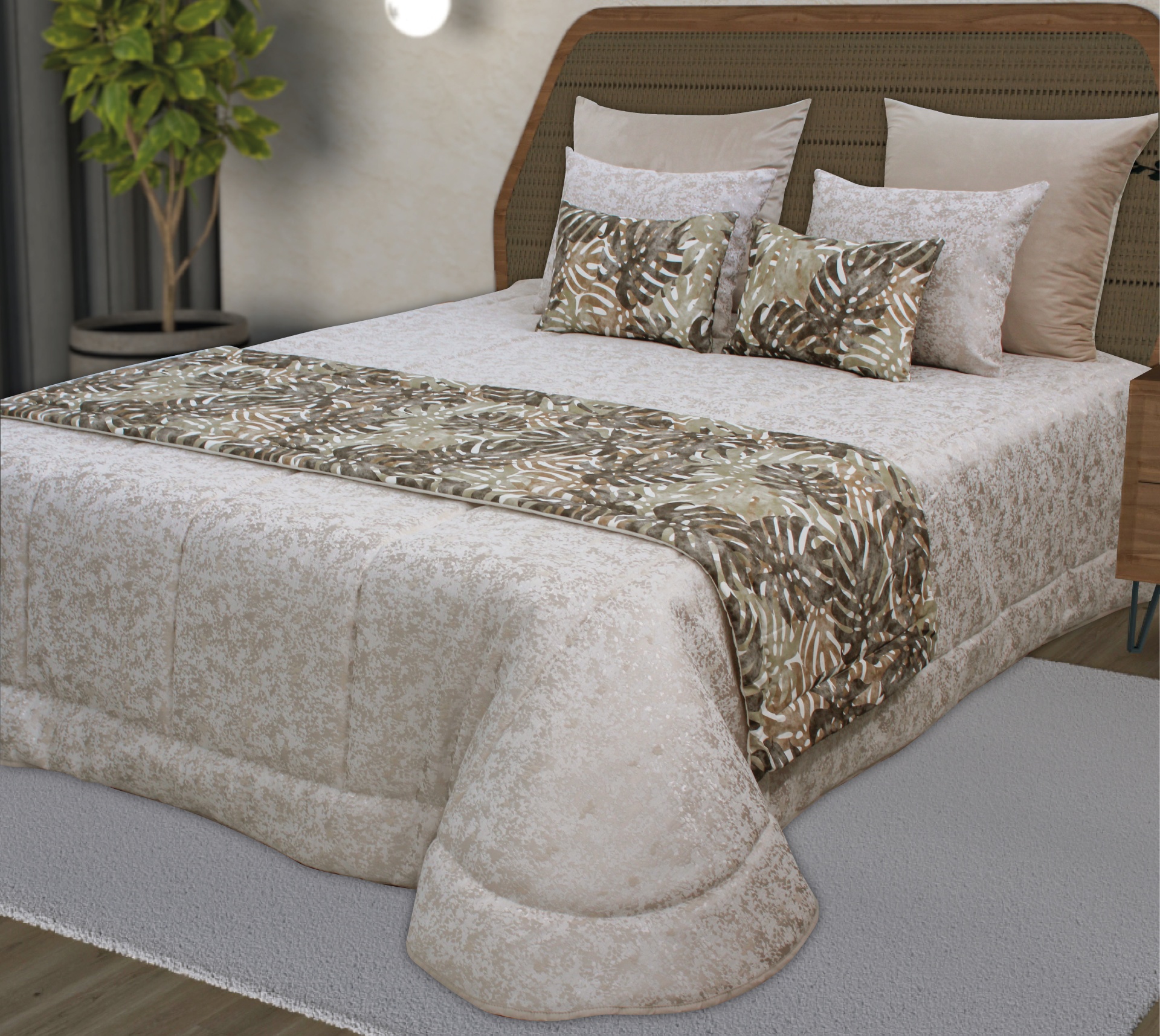 Cama com edredão bege e manta com padrão de folhas em tons terra