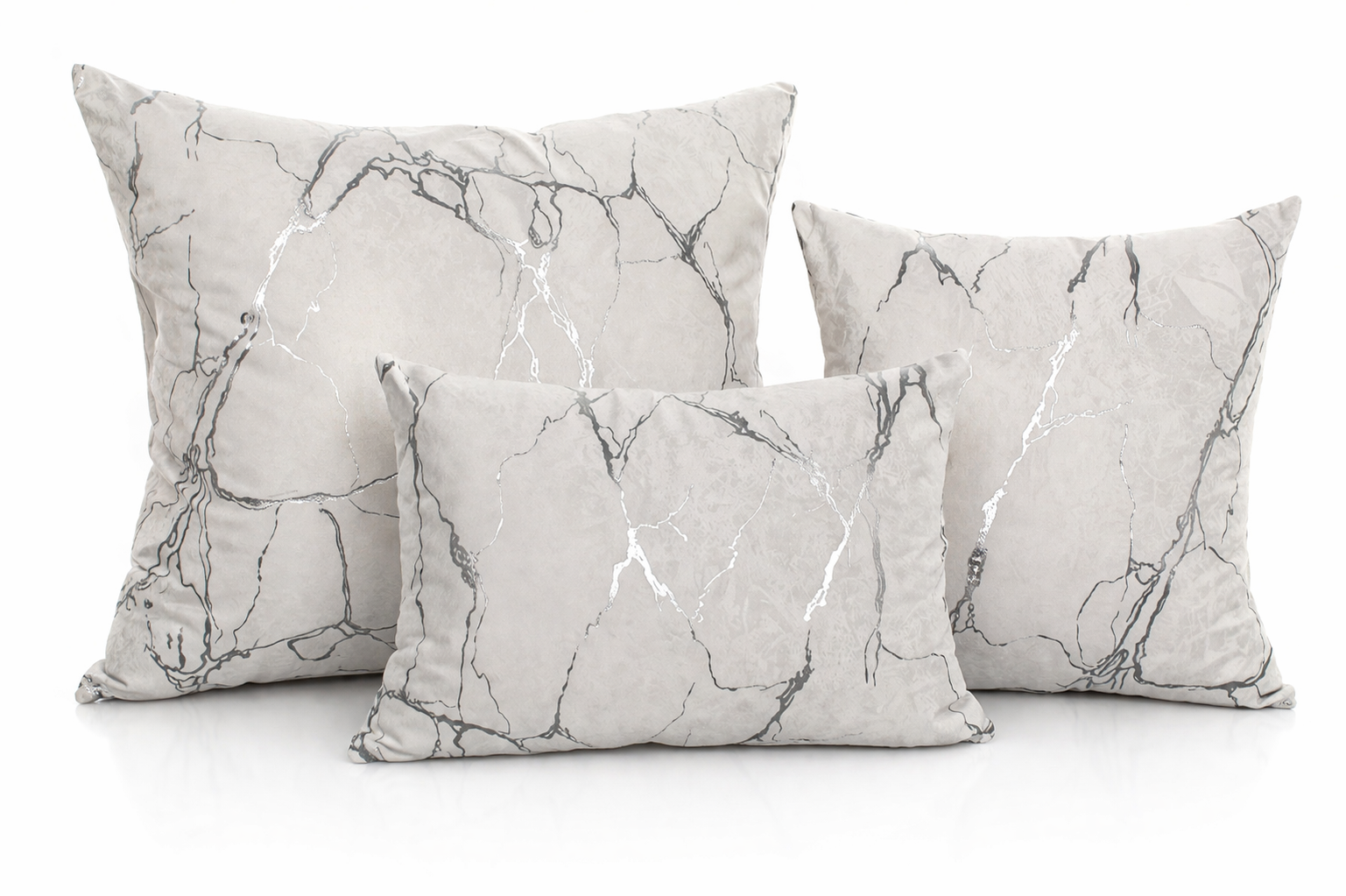 Conjunto de três almofadas cinzentas com padrão mármore