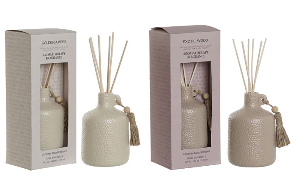 Difusores de aroma de cerâmica com varetas de madeira, embalados em caixas com texto em inglês