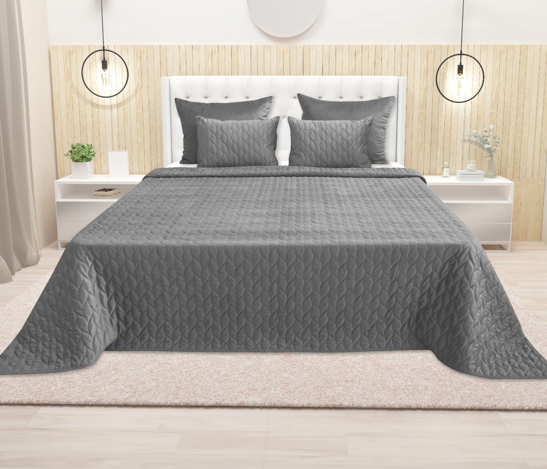 Colcha cinzenta acolchoada em cama com cabeceira branca e mesas de cabeceira brancas