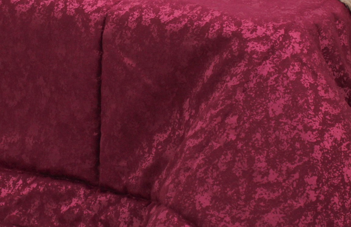 Têxtil vinho com textura aveludada