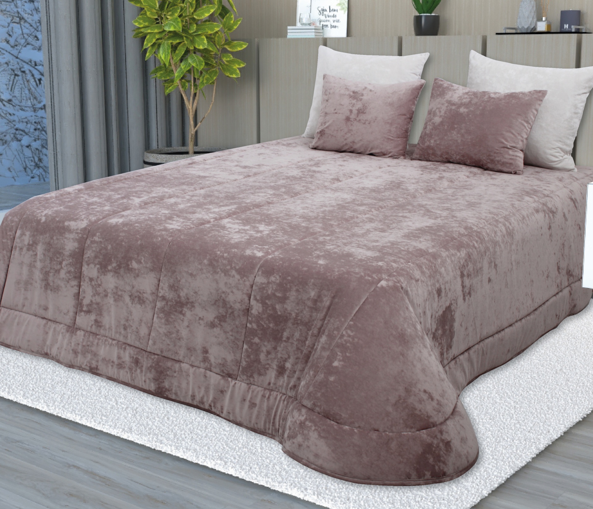 Cama com colcha e almofadas rosa velho em quarto decorado