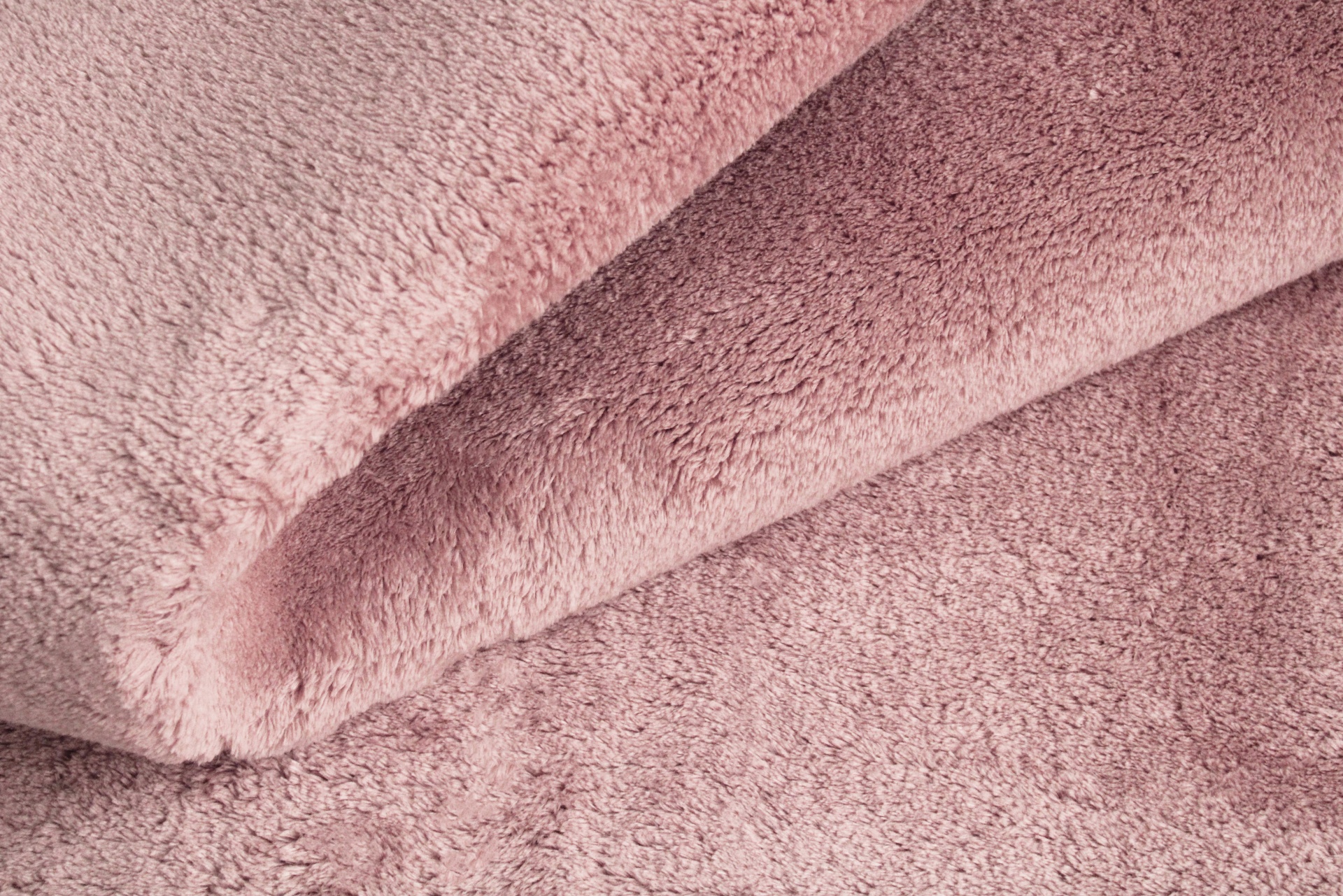 Tecido felpudo cor de rosa claro com textura macia
