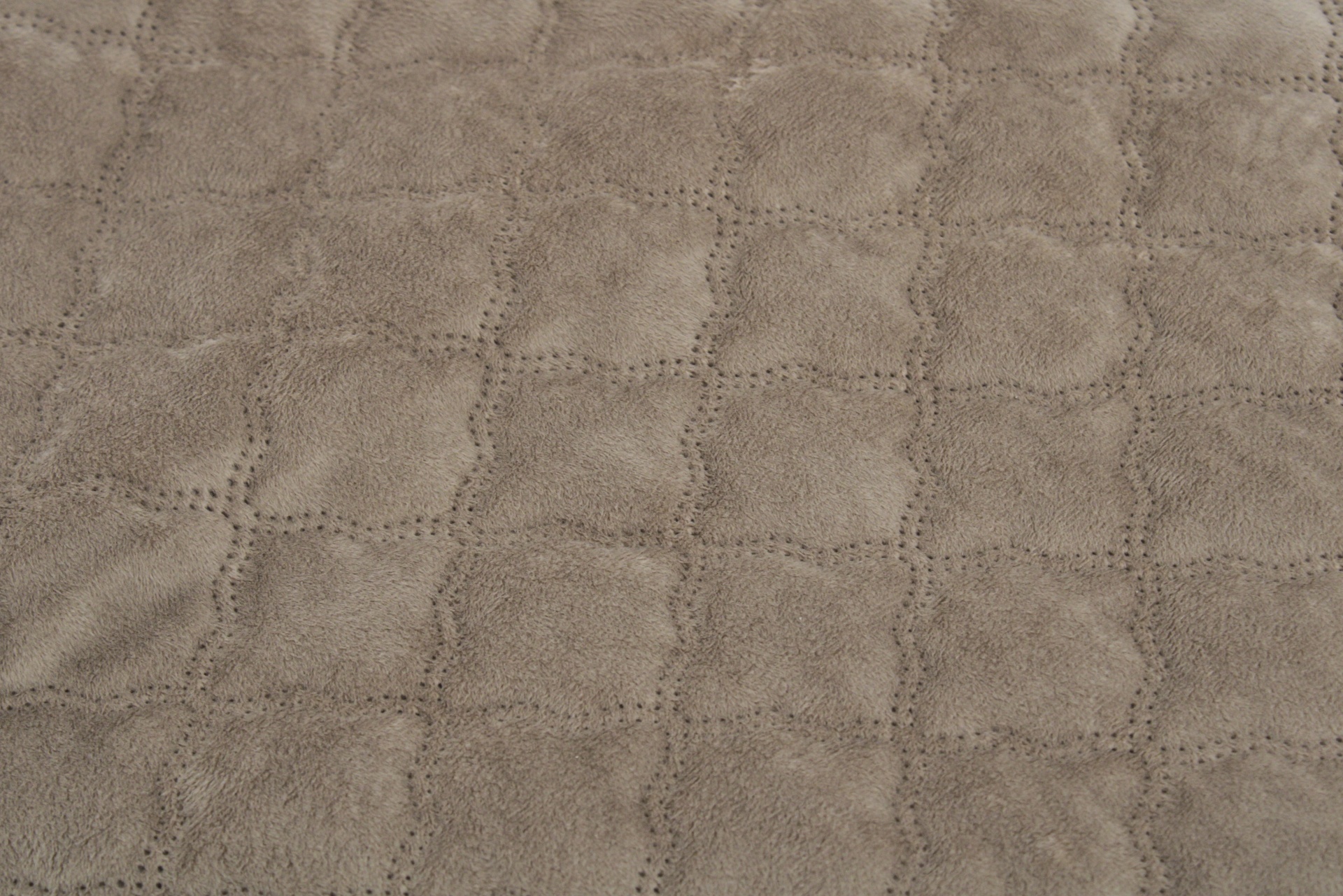 tecido cinza com padrão em relevo e textura aveludada