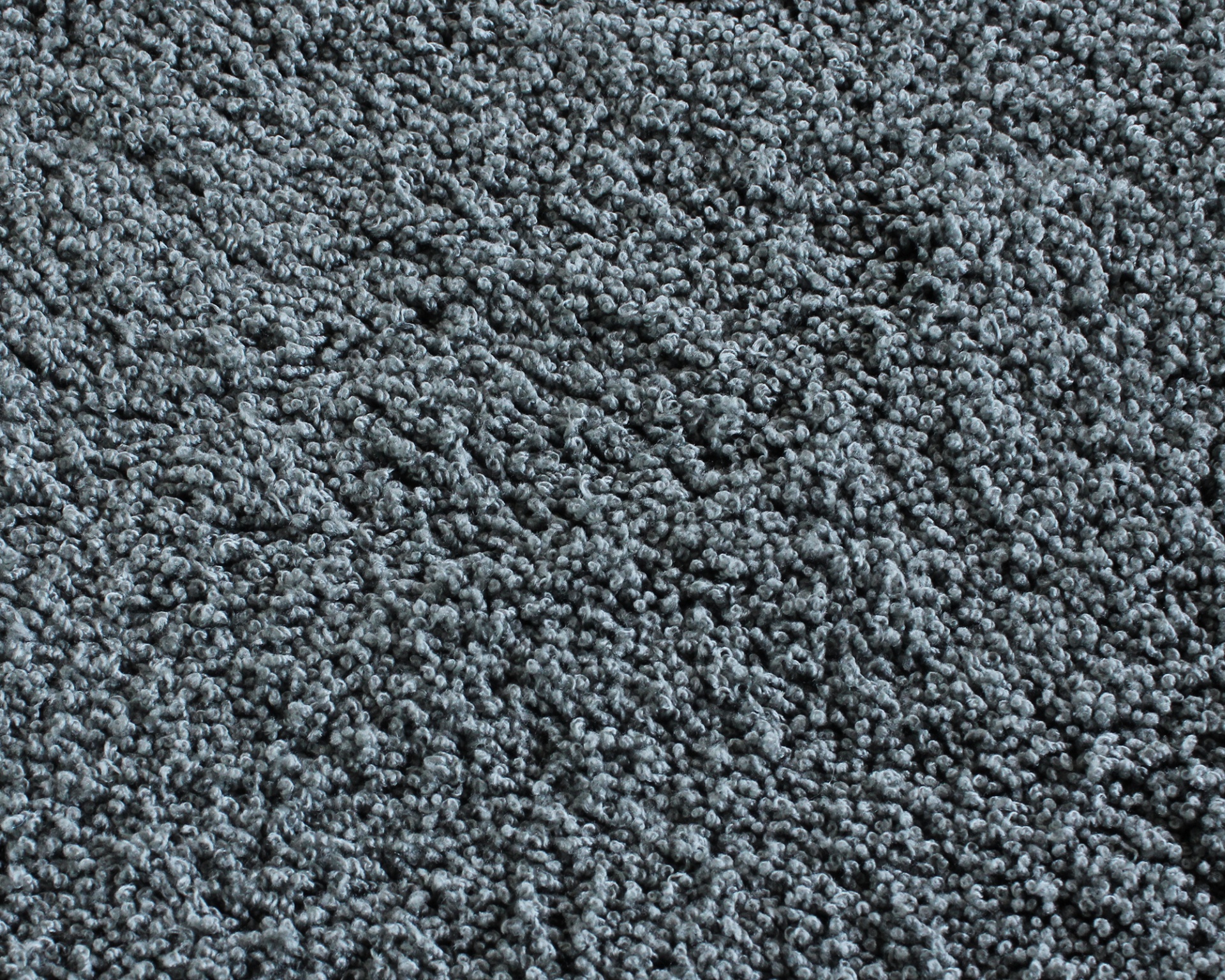Tecido felpudo cinza de textura densa