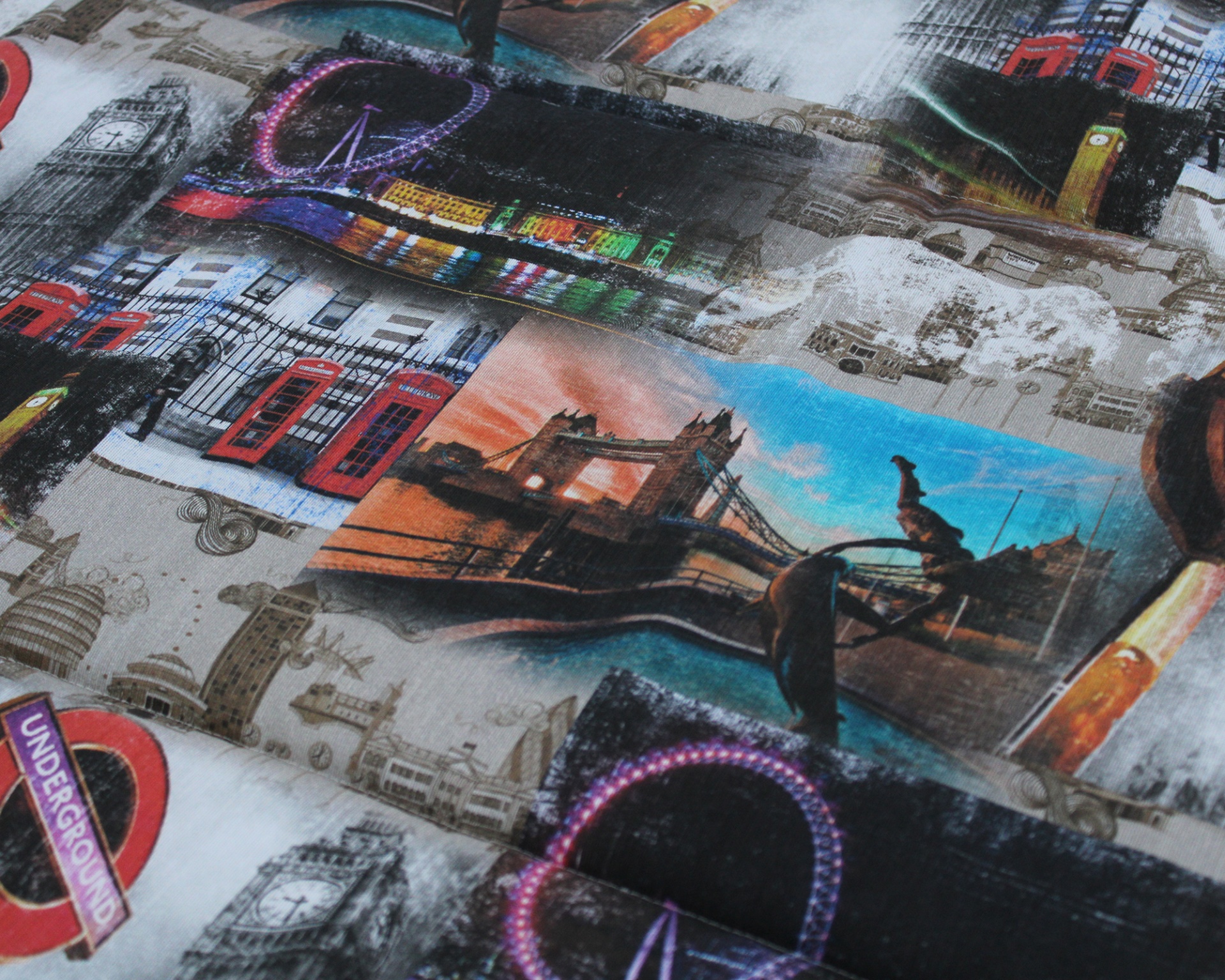 Tecido estampado com imagens de Londres e sinais do metrô.
