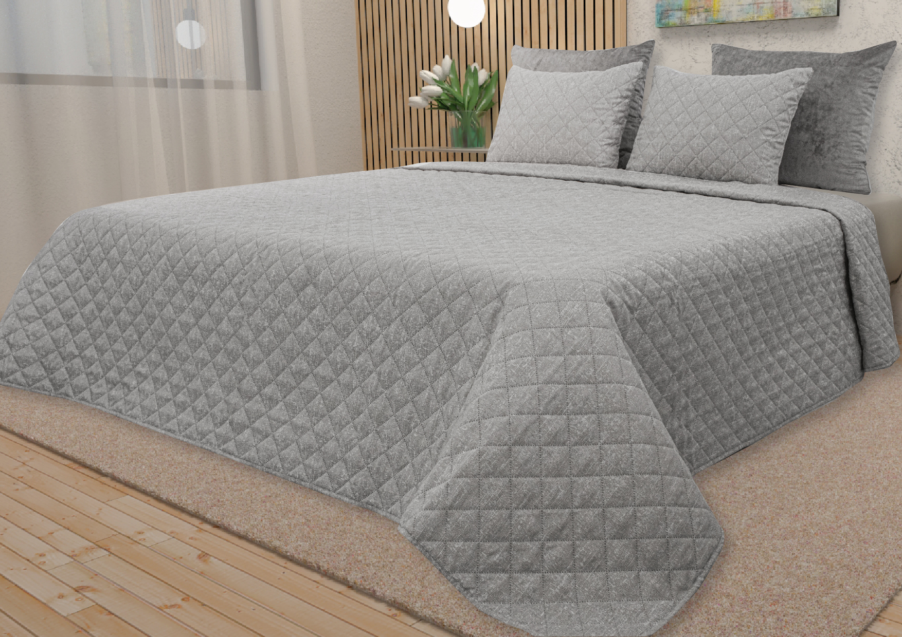 Colcha cinzenta matelassada com padrão de losangos numa cama