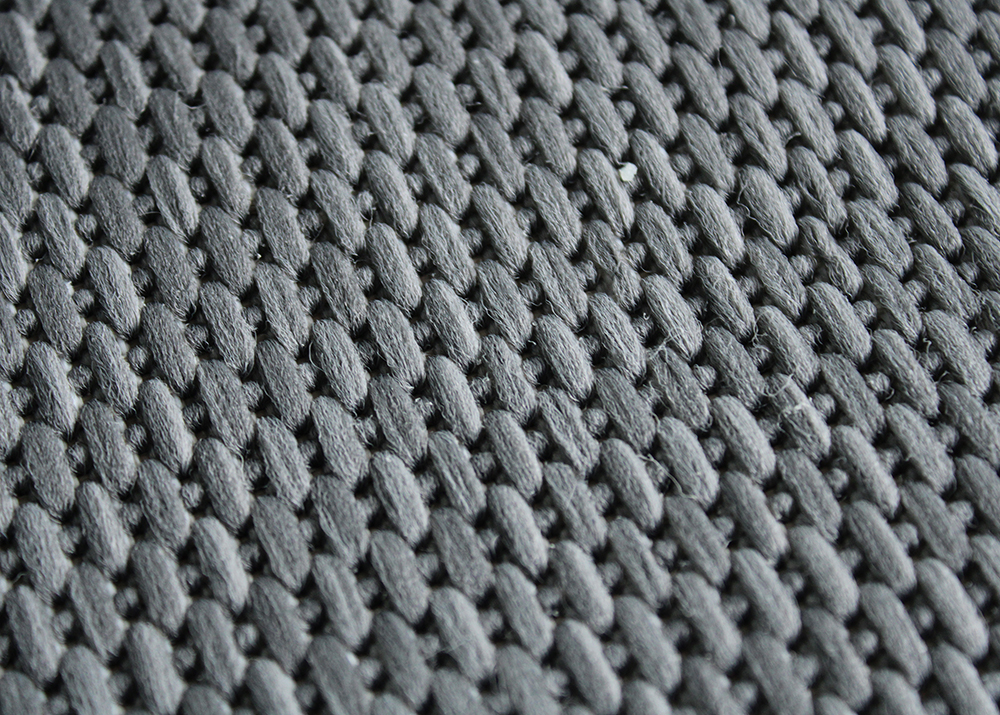 Tecido cinza trançado com textura detalhada
