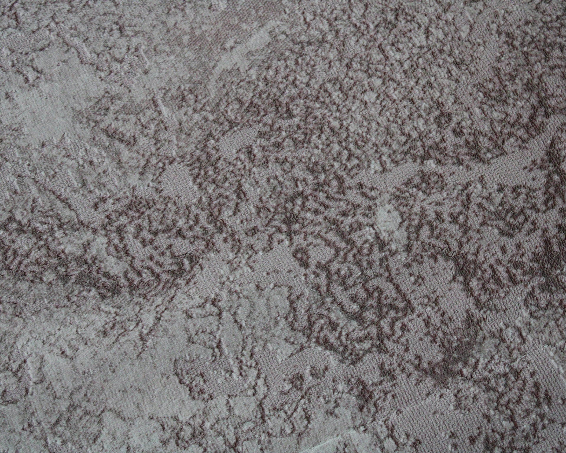 tecido cinza com padrão texturizado e efeito rústico