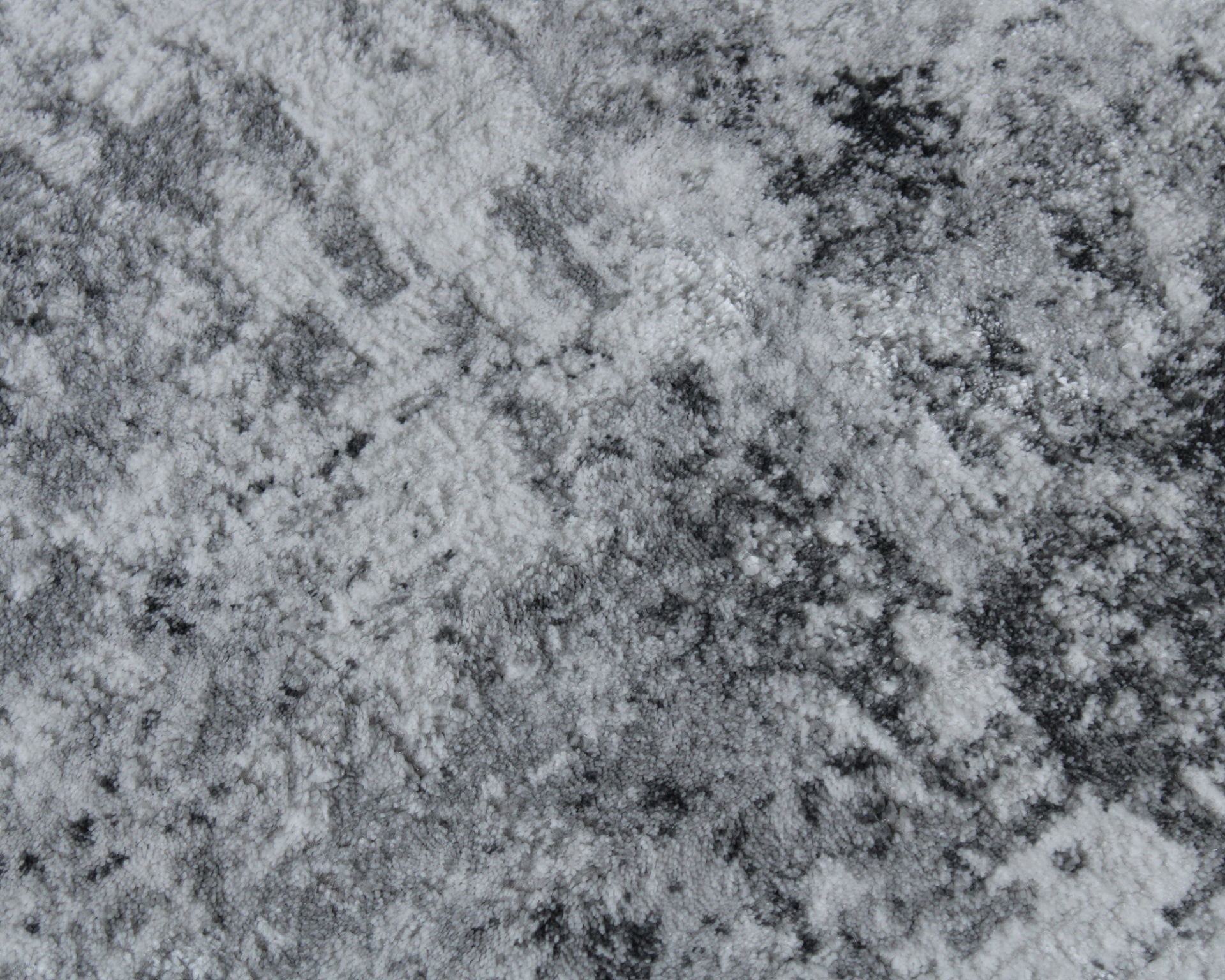 Tapete cinzento com padrões abstratos em tons de cinza