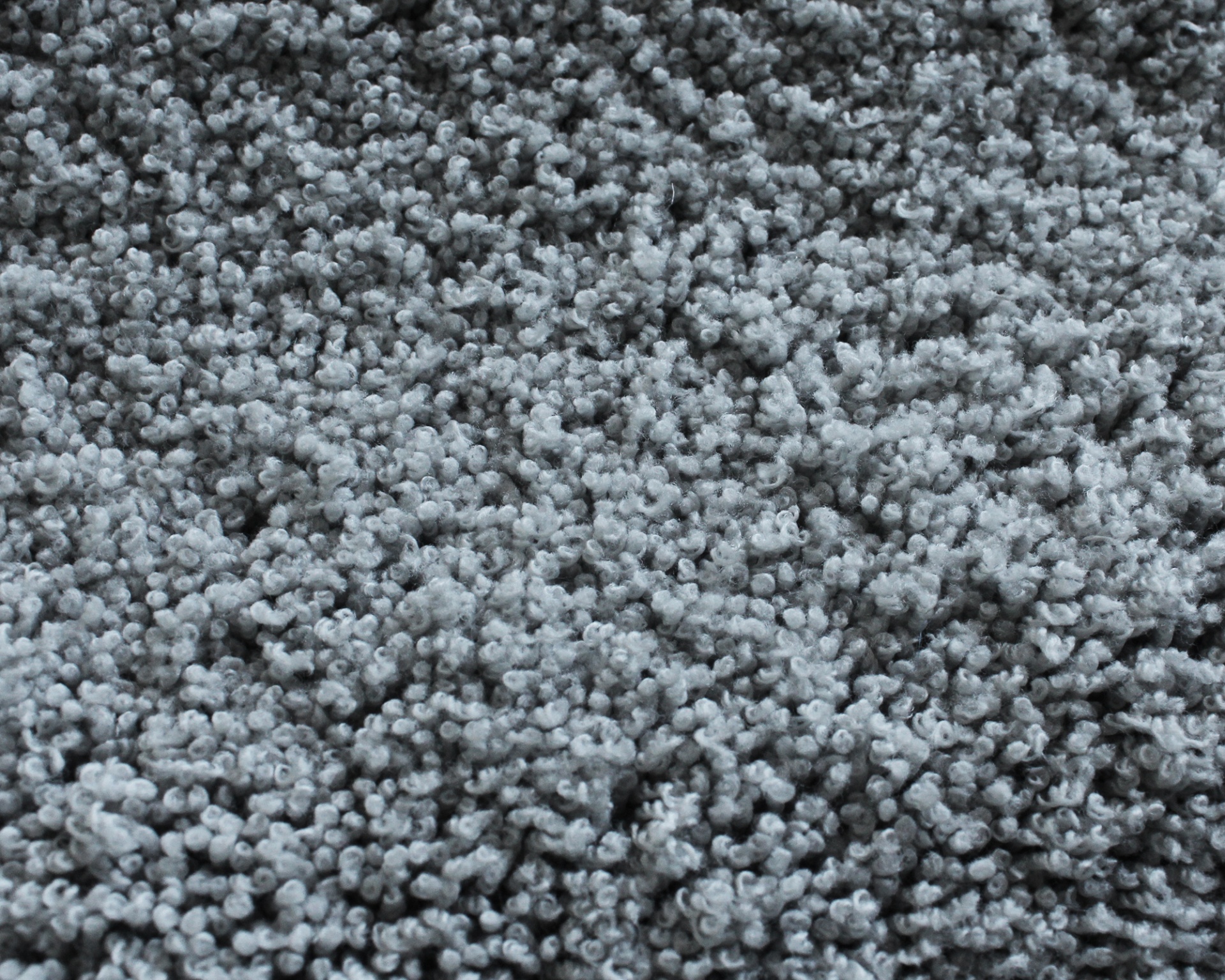 Tecido ou carpete cinzento felpudo