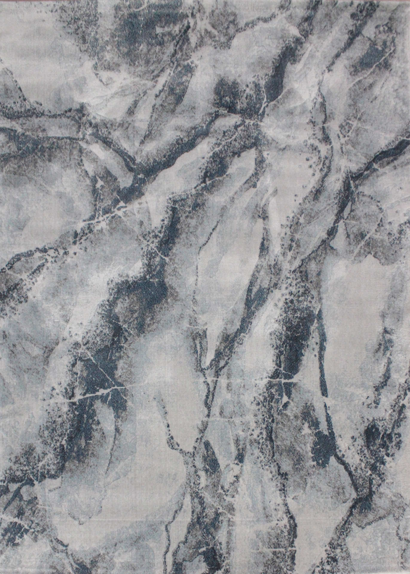 Pano com padrão marmorizado em cinza e branco