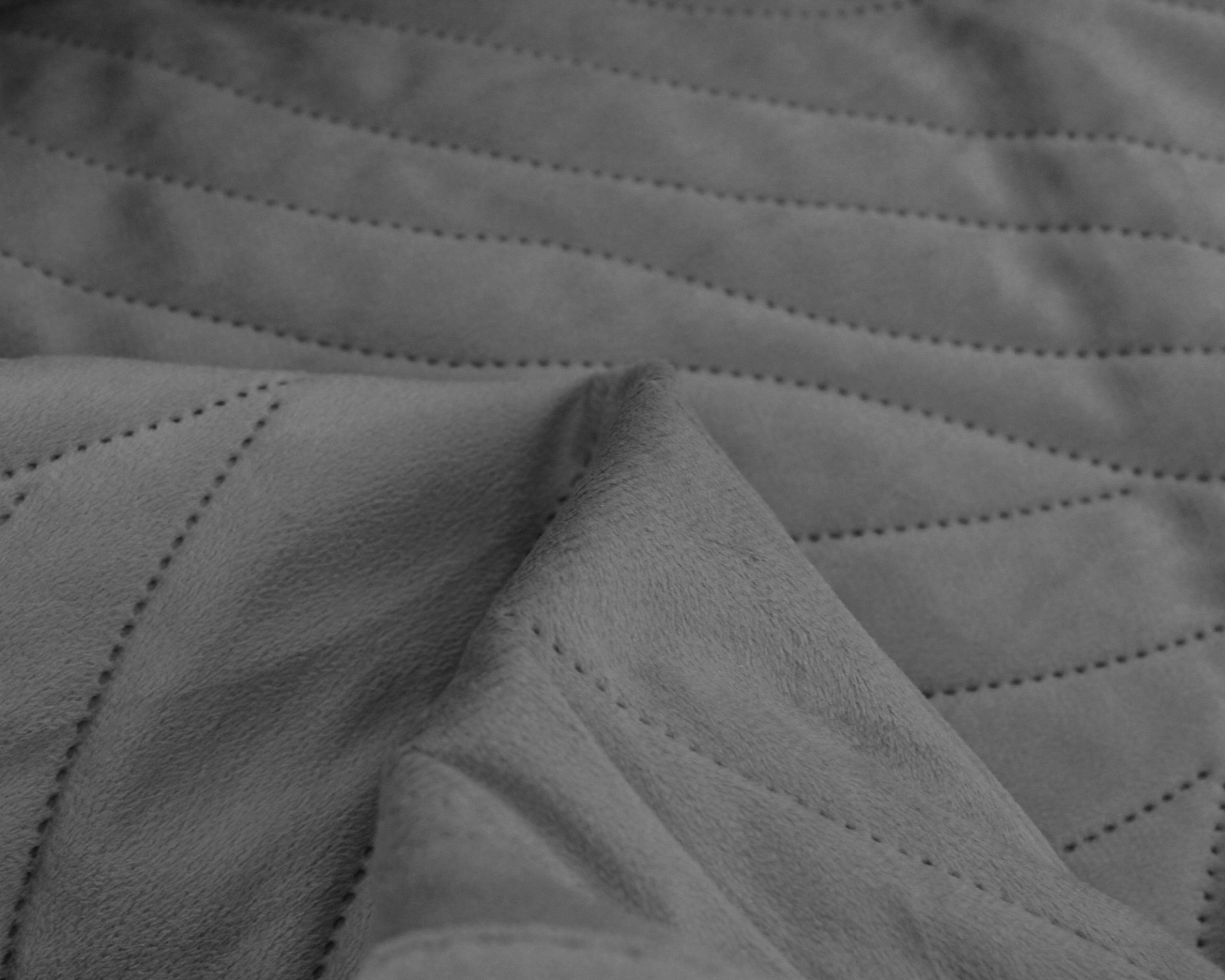 tecido cinzento com costura diagonal e textura macia