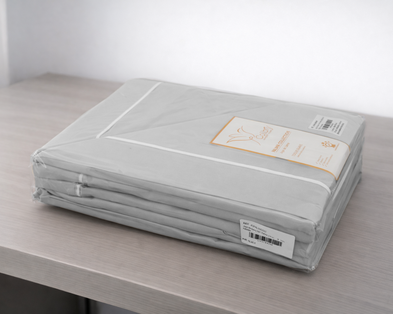 Pacote de roupa de cama cinzenta claro com etiqueta Colour 100% Algodão