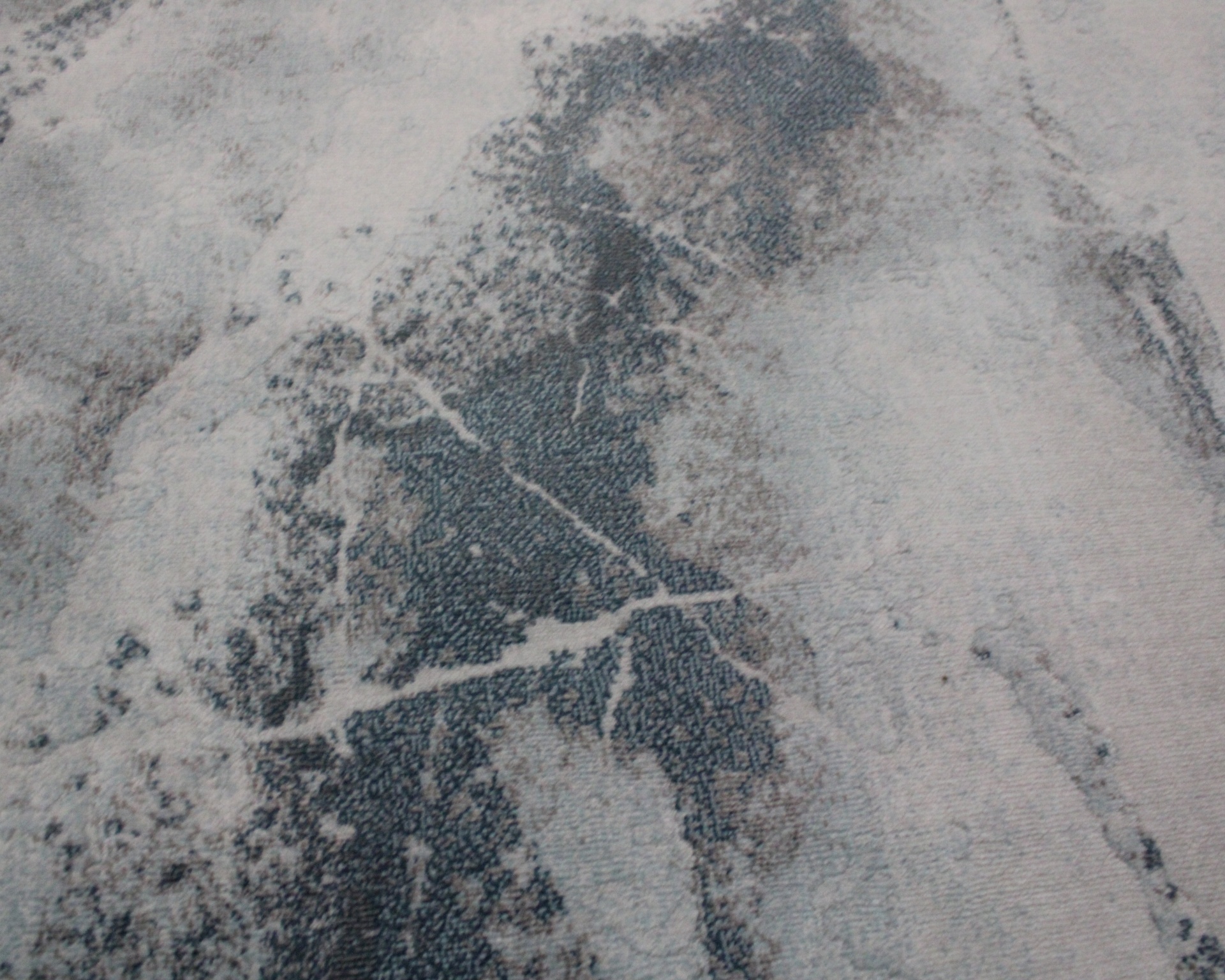 Textura rugosa cinzenta com manchas e rachaduras