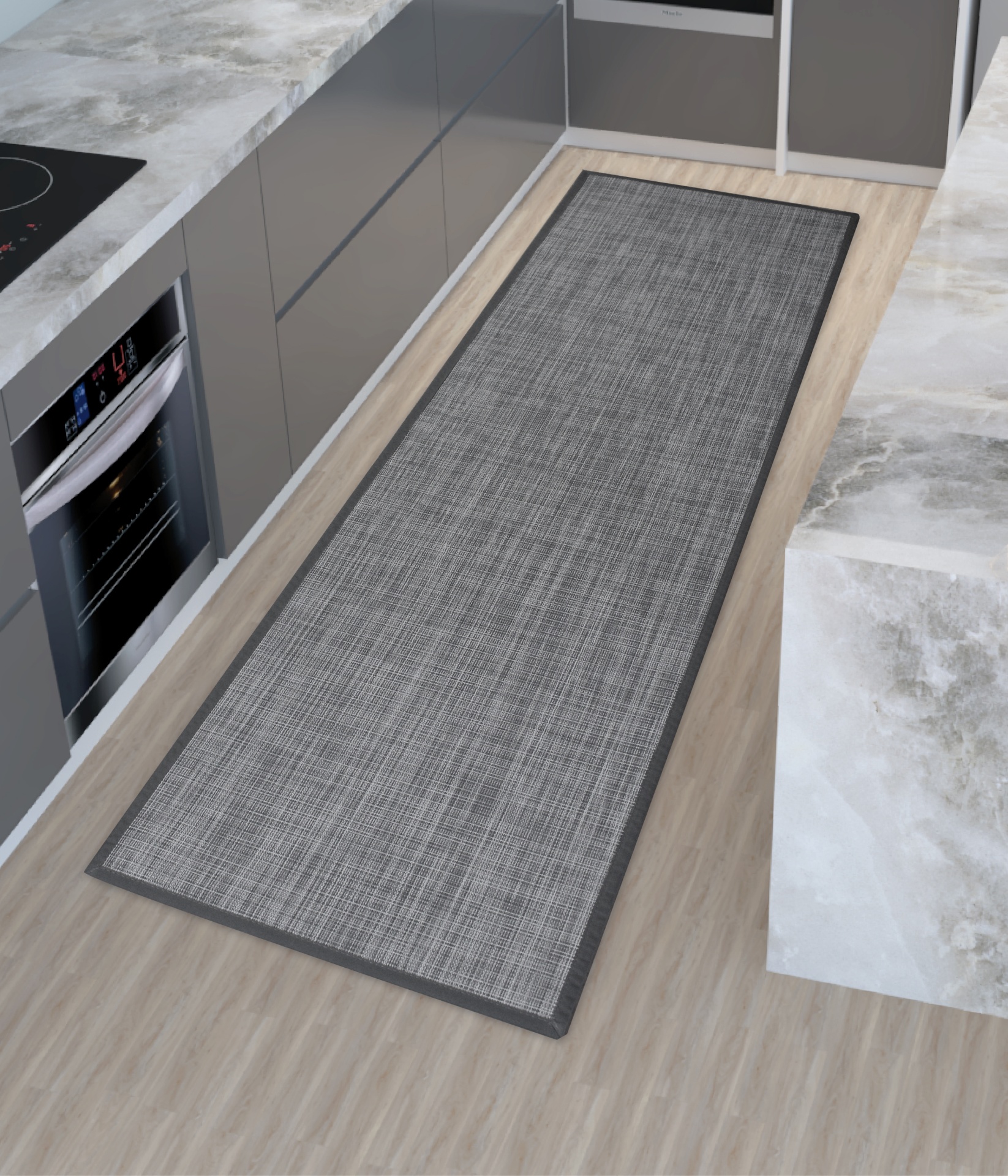 Tapete retangular cinza com bordas escuras numa cozinha moderna