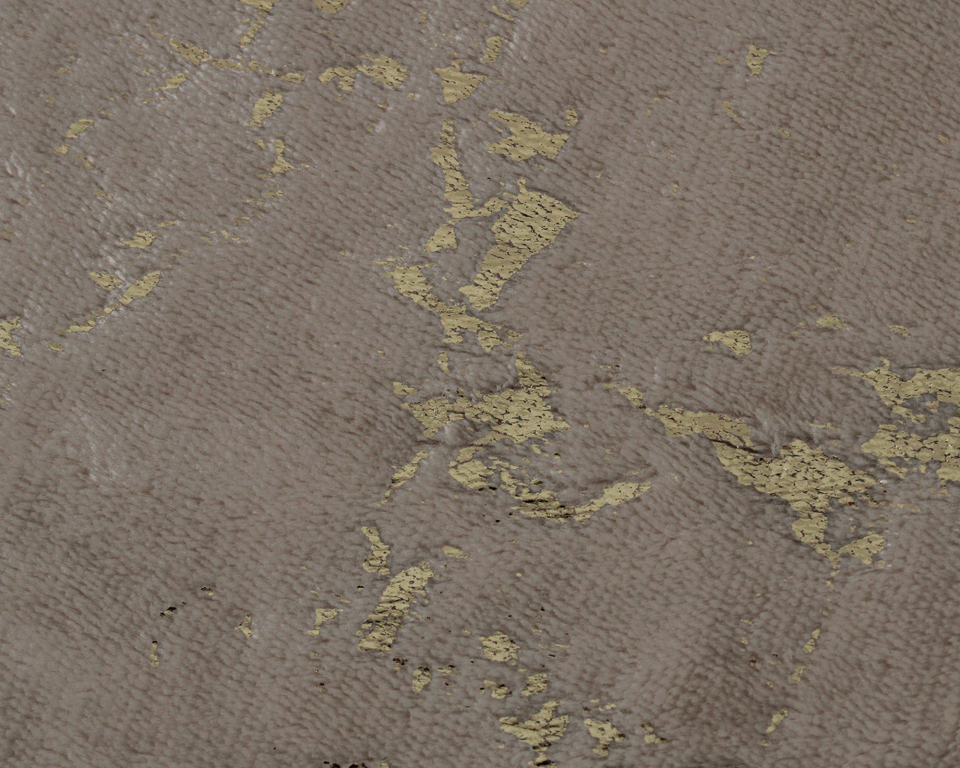 Textura de tecido cinza com manchas douradas irregulares