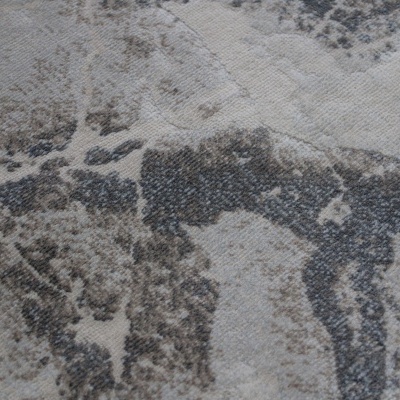 tecido com padrão abstrato em tons cinza e bege