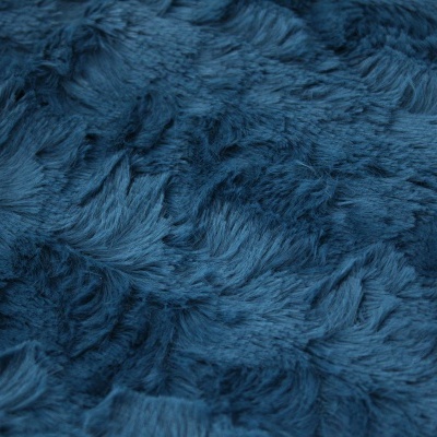 tecido azul felpudo e macio com padrões irregulares