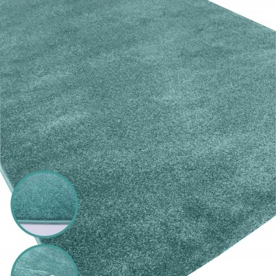 Tapete azul turquesa com textura macia e verso antiderrapante