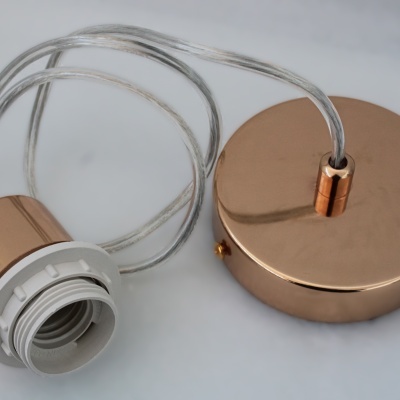 Candeeiro suspenso em metal cobre com cabo branco transparente e base redonda