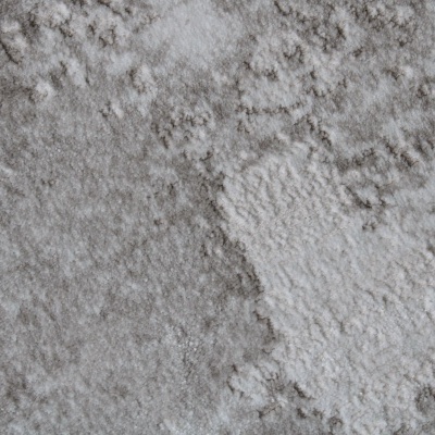 Tapete cinza e branco com padrão abstrato e textura felpuda