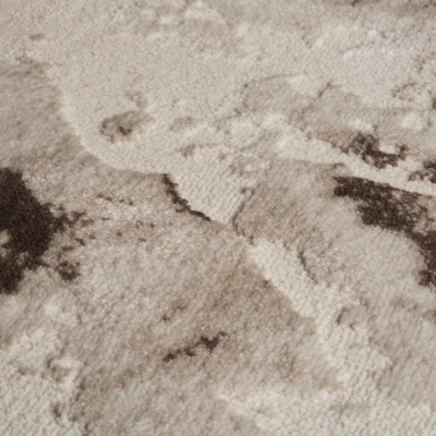 Padrão abstrato em tecido felpudo bege e castanho