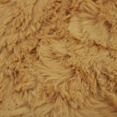Tecido felpudo cor de mostarda com textura macia.