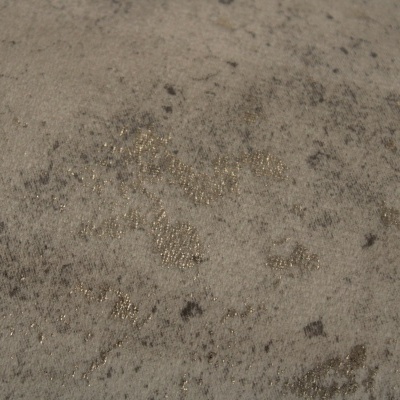 Tecido cinzento com padrões dourados brilhantes