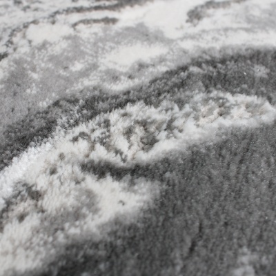 Tecido cinzento com padrão abstrato branco e cinza claro absorvente