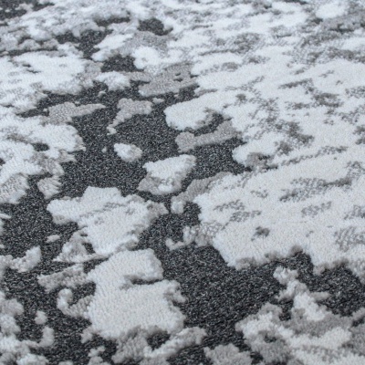 Tapete cinzento, branco e preto com padrão abstrato e textura variada