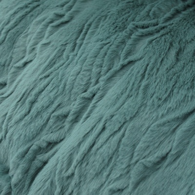 Tecido felpudo verde azulado com textura irregular