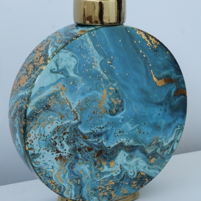 Frasco redondo decorativo azul com detalhes dourados