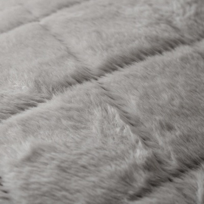 tecido cinza felpudo acolchoado em padrão quadrado