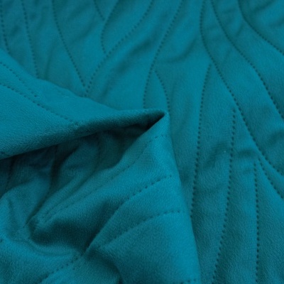 tecido azul turquesa com padrão de ondas costuradas