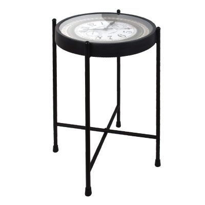 Mesa pequena de metal preto com tampo redondo que imita um relógio