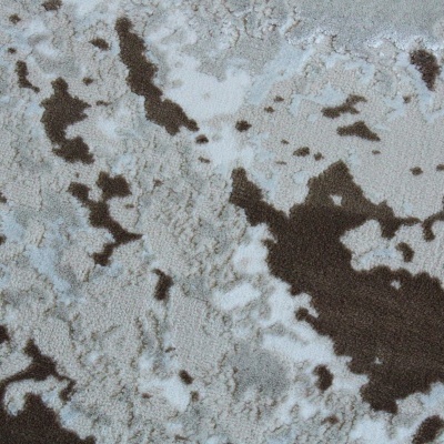 Padrão de tapete felpudo bege, cinza e castanho escuro