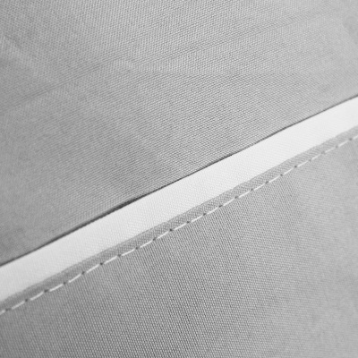 Close-up de tecido cinzento com costura branca