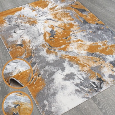 Tapete retangular com padrão abstrato em amarelo ocre, cinza e branco