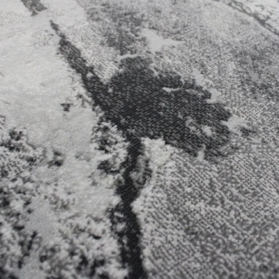 Padrão abstrato em tecido cinza, preto e branco com textura