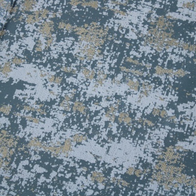 Tecido com padrão pixelado digital em tons de azul, cinza e dourado.