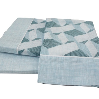 Panos de cozinha azuis com padrão geométrico branco e azul