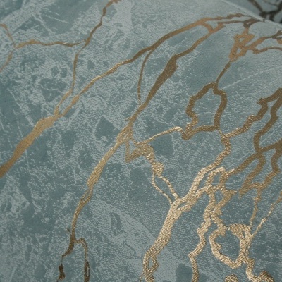 Tecido azul com padrão de veias douradas brilhantes
