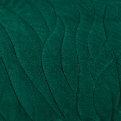 Tecido verde escuro com padrão costurado ondulado